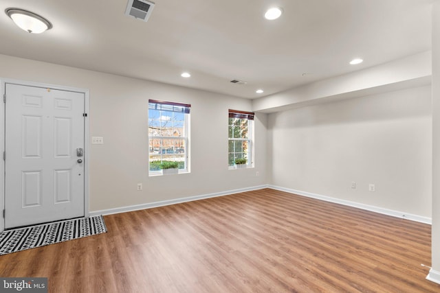 foyer entrance with hardwood / wood-style floors