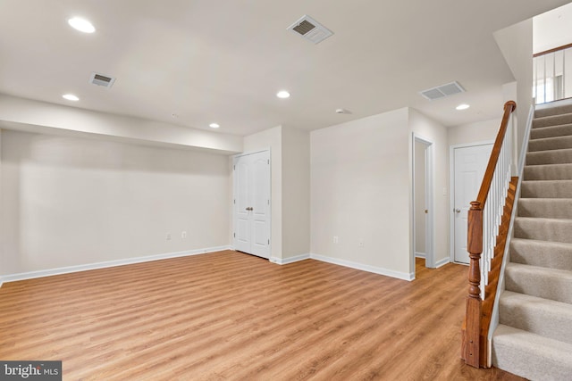 basement with light wood-type flooring