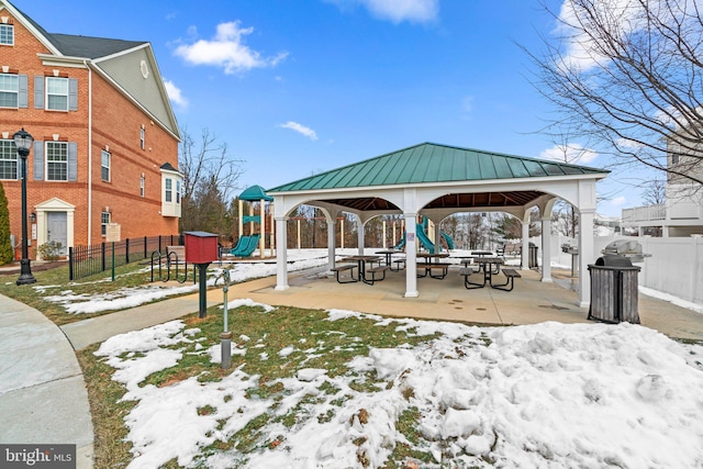 view of property's community featuring a gazebo and a playground