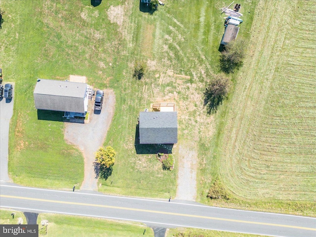 birds eye view of property featuring a rural view