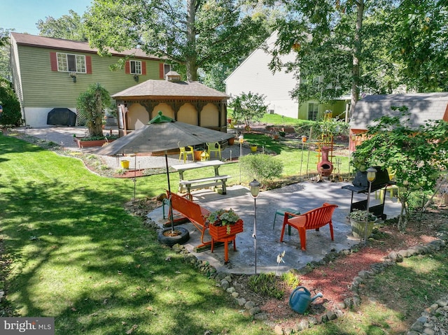 exterior space featuring a lawn and a patio