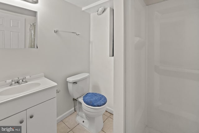 bathroom featuring tile patterned floors, toilet, curtained shower, and vanity