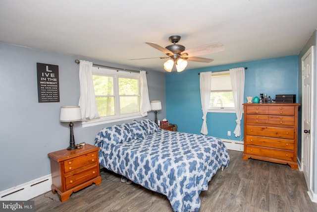 432 Swartley Rd, Hatfield, PA 19440 - bedroom with baseboards, a baseboard heating unit, and wood finished floors