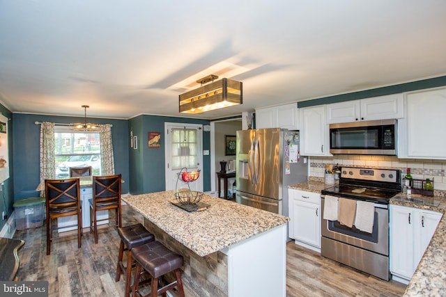 432 Swartley Rd, Hatfield, PA 19440 - kitchen featuring light wood finished floors, white cabinetry, and stainless steel appliances