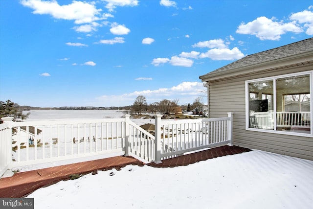 view of snow covered deck