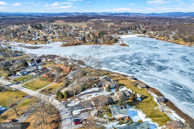 aerial view with a water and mountain view