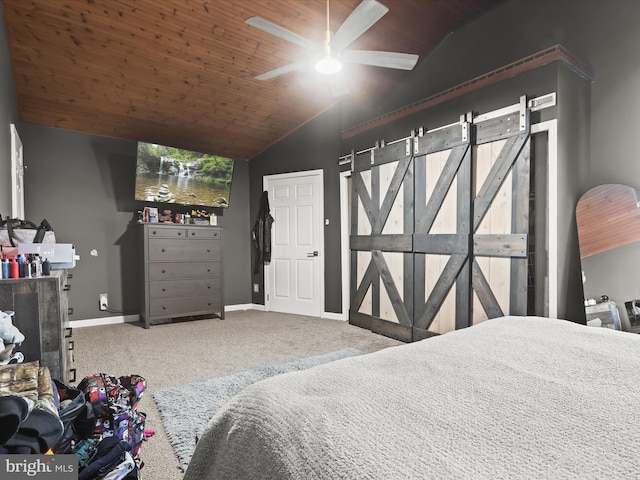 bedroom with ceiling fan, lofted ceiling, carpet flooring, and wooden ceiling