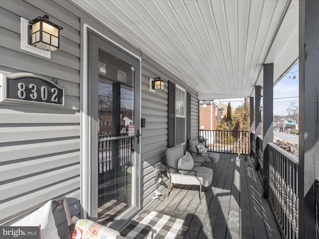 wooden terrace with covered porch