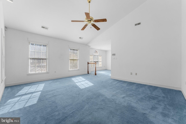 unfurnished living room featuring high vaulted ceiling, carpet, visible vents, and baseboards