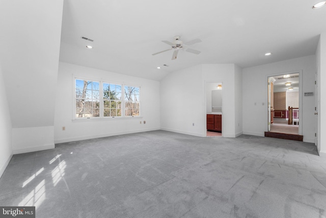 unfurnished bedroom featuring recessed lighting, visible vents, light carpet, and baseboards