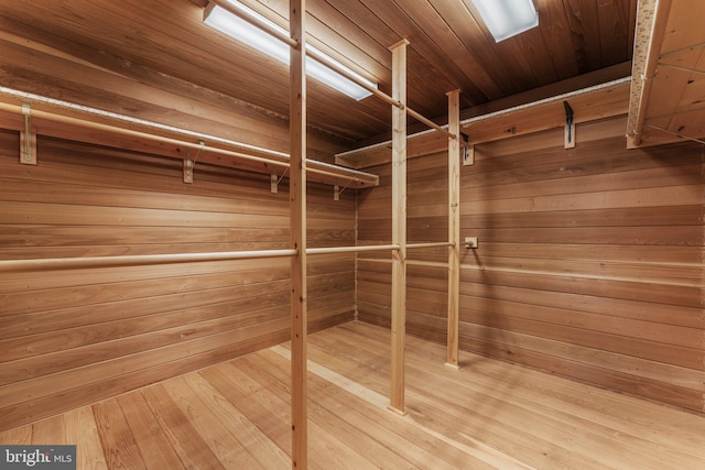 spacious closet with wood finished floors