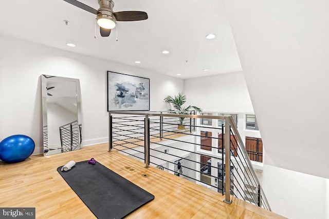 workout area featuring hardwood / wood-style floors