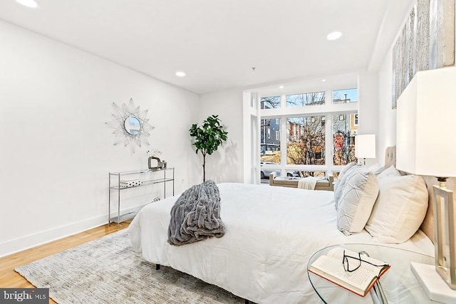 bedroom featuring wood-type flooring