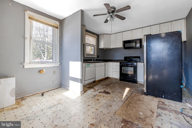 kitchen featuring white cabinetry, sink, black appliances, and ceiling fan