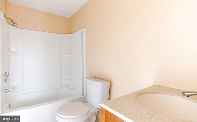 full bathroom with vanity, washtub / shower combination, and toilet