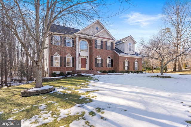 view of front of house with a lawn