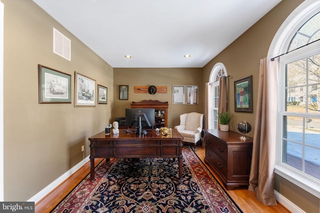 office area featuring light hardwood / wood-style flooring