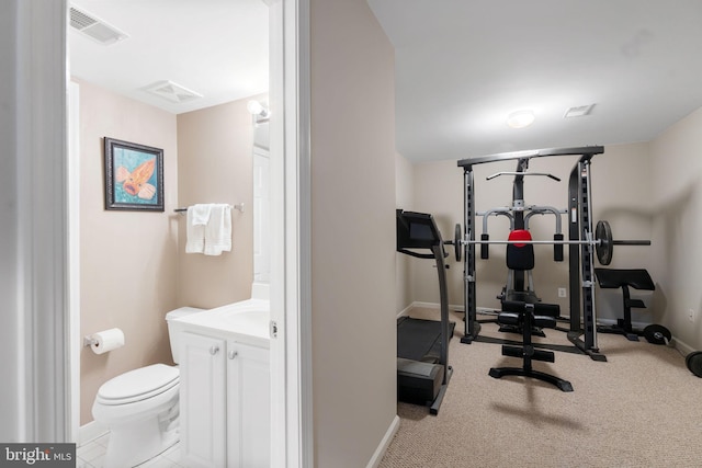 workout area with light colored carpet