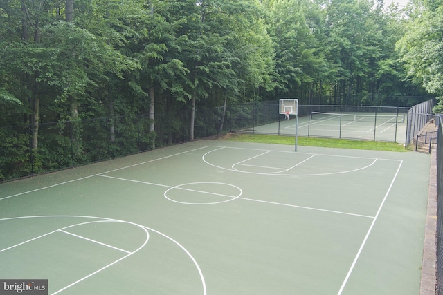 view of sport court with tennis court