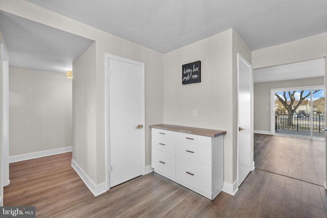 hall with light wood-type flooring