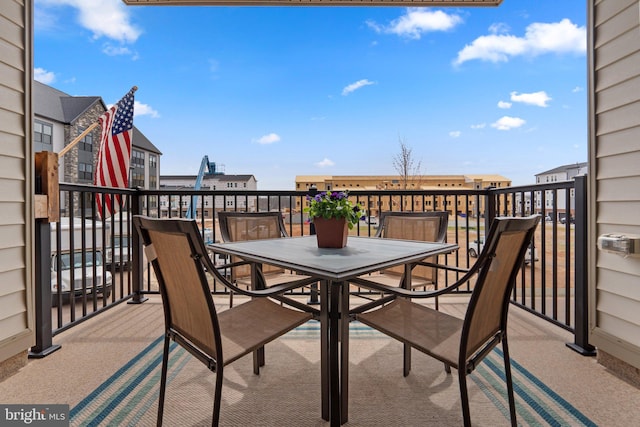 view of patio / terrace with a balcony