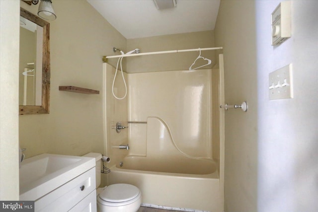 full bathroom featuring vanity, bathtub / shower combination, and toilet