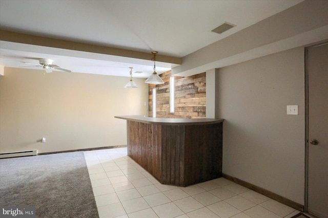 bar featuring pendant lighting, ceiling fan, built in shelves, and light tile patterned floors