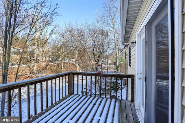 view of snow covered deck