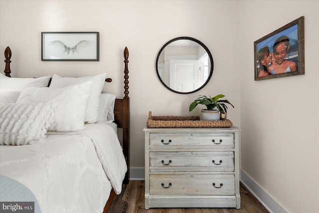 bedroom featuring dark hardwood / wood-style floors