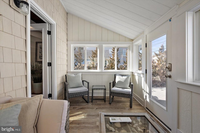 sunroom / solarium with lofted ceiling