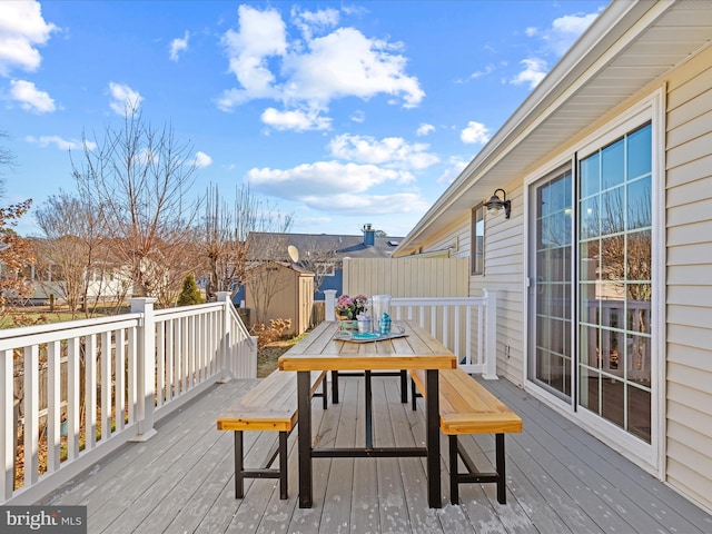 deck featuring a shed