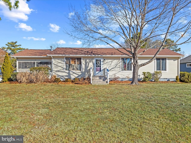 single story home featuring a front yard