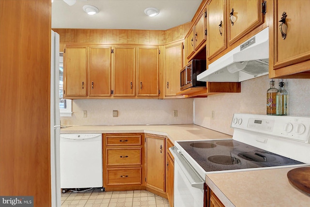 kitchen with white appliances