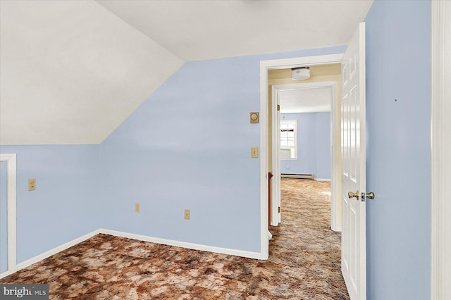 additional living space featuring lofted ceiling, carpet flooring, and baseboard heating