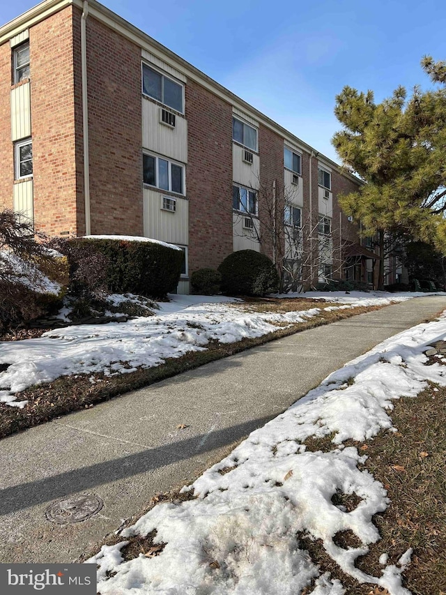 view of snow covered property