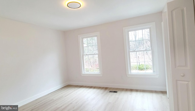 empty room featuring light hardwood / wood-style floors