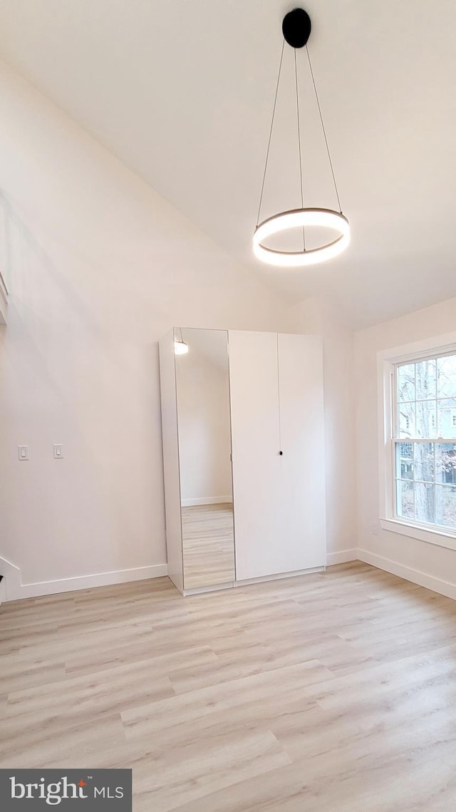 spare room featuring light hardwood / wood-style flooring