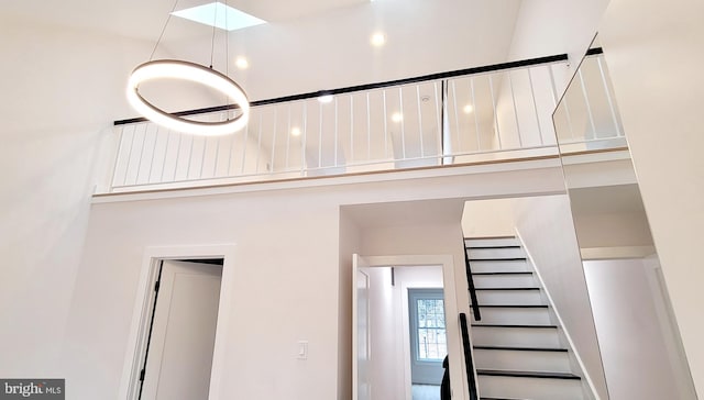 stairway with a high ceiling