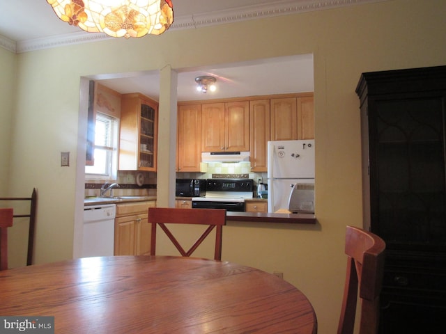 kitchen featuring sink, a chandelier, decorative backsplash, crown molding, and white appliances