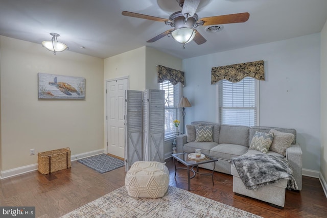 living room with hardwood / wood-style flooring and ceiling fan