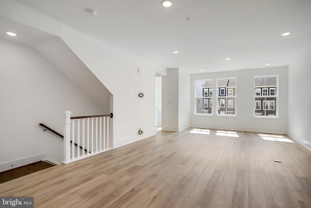 unfurnished living room featuring light wood-type flooring