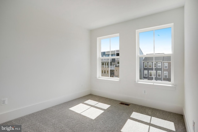 view of carpeted spare room