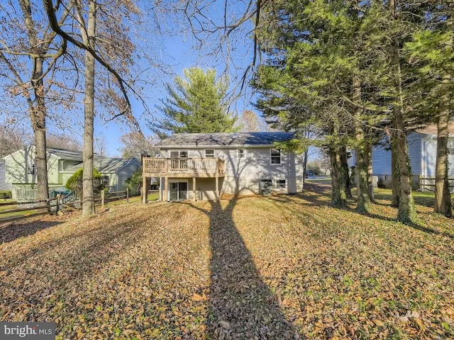 view of front facade with a wooden deck