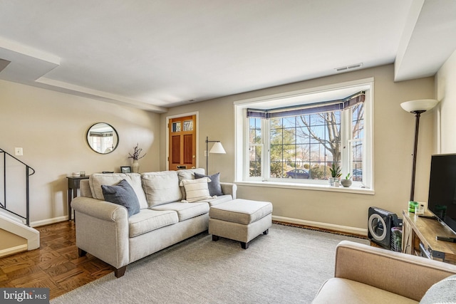 living room with parquet floors