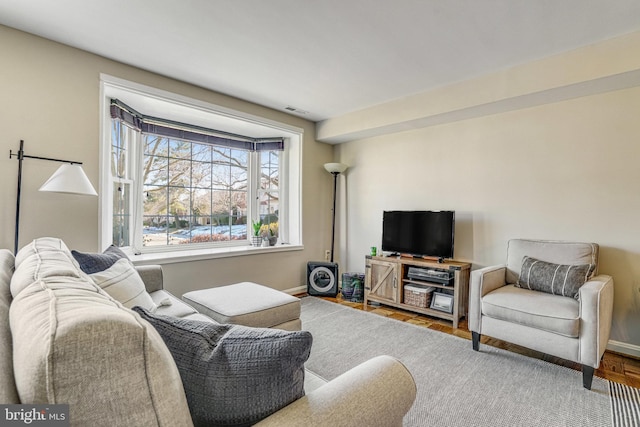 living room with parquet floors