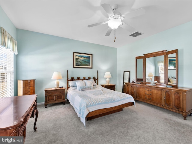 carpeted bedroom featuring ceiling fan