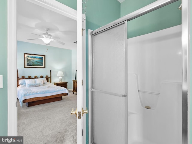 carpeted bedroom featuring ceiling fan