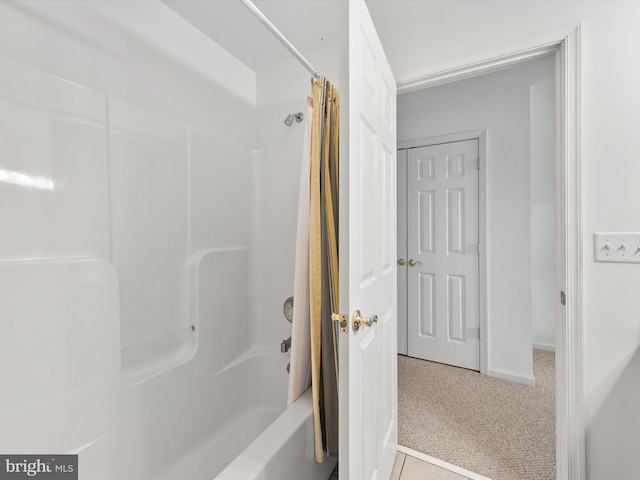 bathroom featuring shower / bathtub combination with curtain