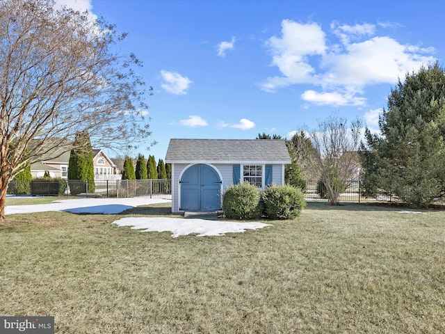 exterior space with a front yard and a storage unit