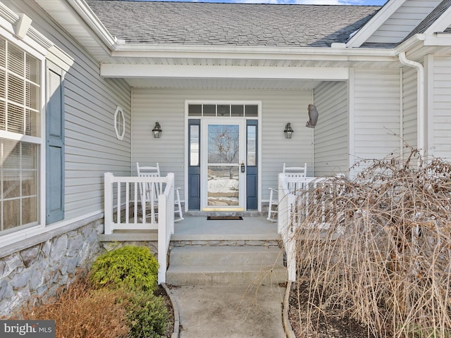 property entrance featuring a porch